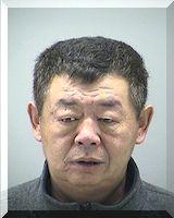 Inmate Wenquing Li