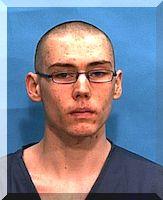 Inmate Travis J Raslich