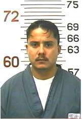 Inmate FLORES, MOSES A