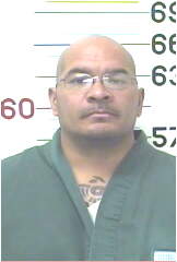 Inmate FLORES, ALFONSO R