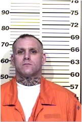 Inmate AMES, SCOTT A