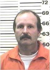 Inmate COX, DENNIS G