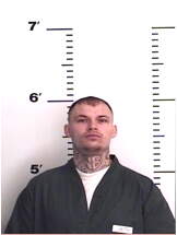 Inmate SLADE, JAMES A